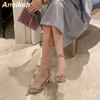 Crystal Butterfly Knot Pointed Toe Pumps