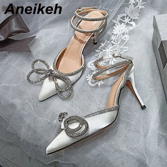Crystal Butterfly Knot Pointed Toe Pumps
